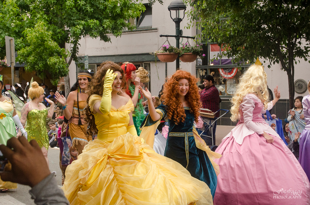 Princesses in gowns walk in the Kiddie Kapers Parade Salinas Ca