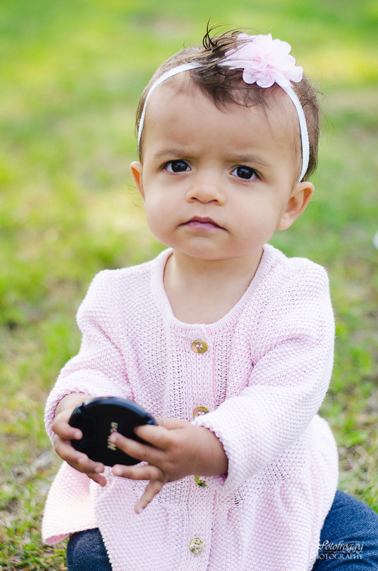 Fotofroggy Photography - little girl holding Nikon lenscap